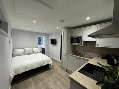 combined kitchen and sleeping space